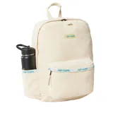 Mochila Rip Curl color crema, confeccionada en pana con logo bordado y detalles en celeste.