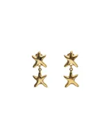 Aros colgantes bañados en oro 18k con diseño de doble estrella de mar articulada.
