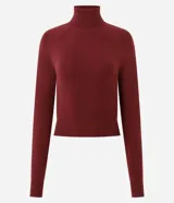 Blusa de punto de la marca Blue Steel, con cuello alto, manga larga y diseño básico ajustado al cuerpo.