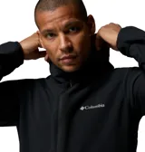 Campera cortaviento Columbia Trailborne Jacket Omni-Shield de color negro, con capucha integrada, cierre frontal y bolsillos laterales con cremallera. Cuenta con tecnología Omni-Shield que repele la humedad y resiste las manchas.