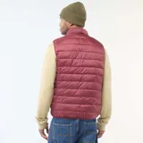 Chaleco acolchado tipo puffer en color bordó, con cierre frontal y cuello alto.