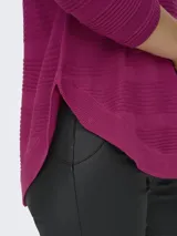 Sweater negro de punto acanalado con cuello redondo y manga larga, de calce regular.