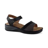 Sandalias negras con plataforma, tira ancha con textura en la capellada y pulsera con hebilla.