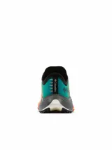 Championes de trail running Columbia modelo Konos Speed Trail, con diseño degradado en tonos naranja y verde, suela de gran tracción y mediasuela amortiguada.