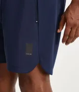 Bermuda deportiva Get Over de color azul marino, con cintura elástica ajustable mediante lazo y dos bolsillos laterales con cierre de cremallera.