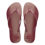 Sandalias Havaianas Slim Gloss negras con estampado de estrellas blancas.