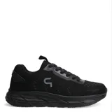 Championes deportivos de hombre en color gris, con cordones negros, detalles en amarillo neón y suela blanca con base negra.