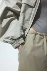 Body colaless de manga larga y escote cuadrado, confeccionado en punto elástico de color gris.