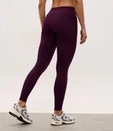 Calza legging deportiva de poliamida color marrón, con cintura alta de 10 cm y diseño ajustado al cuerpo.