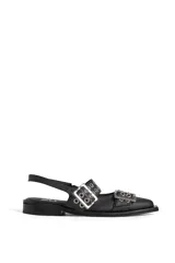 Chatas de cuero color marrón con punta fina, diseño destalonado y dos tiras con hebillas metálicas plateadas decorativas.