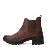 Botas tipo Chelsea de cuero color marrón, con paneles elásticos laterales y suela dentada de goma con tacón bajo.