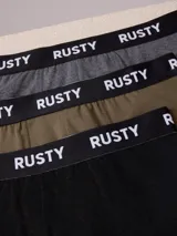 Pack de tres bóxers Rusty con banda elástica con logo y diseño liso.