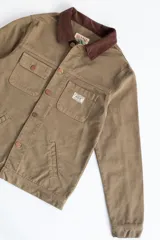 Campera corta de jean verde con cuello marrón, confeccionada en jean grueso 100% algodón.