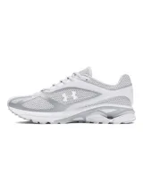 Championes Under Armour modelo HOVR Apparition, de diseño retro inspirado en el año 2009. Presentan una combinación de malla transpirable y refuerzos de cuero en color blanco y gris, con tecnología de amortiguación reactiva UA HOVR en la entresuela.