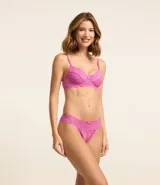 Soutien gris de encaje floral, sin copa y con aro. Breteles finos ajustables y cierre trasero.