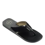 Sandalias tipo ojota Havaianas con base gris oscuro texturizada y tiras anchas de tela negra con interior acolchado en color beige.