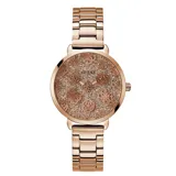 Reloj analógico Guess modelo Sugarplum con caja redonda de 38 mm y correa de eslabones de acero en tono oro rosa. La esfera presenta un acabado brillante con textura y el logo de la marca estampado repetidamente.