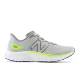 Championes de running New Balance Evoz v3, con capellada de malla técnica en color gris, entresuela Fresh Foam X blanca con detalles en verde neón y suela de goma con tracción.