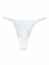 Colaless de encaje color blanco, con tiras laterales regulables y diseño acanalado en la parte frontal.