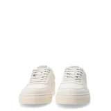Championes urbanos color beige con suela blanca.