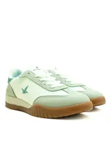 Championes deportivos para mujer Santa Barbara Loop, de color blanco con detalles en verde menta y suela de goma marrón.