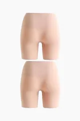 Pack de dos culottes tipo biker moldeadores de tiro alto, confeccionados en tejido elástico seamless con sujeción media en cintura, caderas y glúteos.