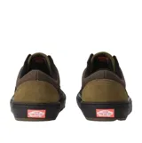 Championes Vans modelo BMX Old Skool, con diseño en tonos marrón y verde oliva. Presenta la icónica banda lateral en color negro, cordones negros y suela de goma negra reforzada. Incluye etiqueta lateral con logo.