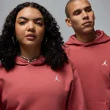 Hoodie de felpa color coral, con capucha, bolsillo frontal tipo canguro, mangas largas y logo Jumpman bordado en el pecho.