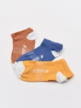 Pack de tres pares de soquetes deportivos de algodón en colores marrón, azul y amarillo con puntera y talón blancos.