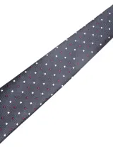 Corbata de seda azul marino con estampado paisley en tonos rosados y blancos.