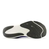 Championes de running New Balance FuelCell Rebel v3, color azul con detalles en negro y blanco.