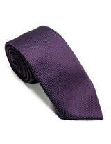 Corbata de seda azul marino con estampado paisley en tonos rosados y blancos.