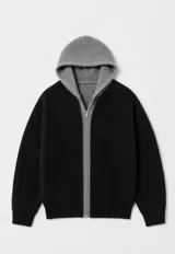 Campera de punto grueso acanalado en color negro con interior y capucha gris, diseño de doble capa y cierre frontal con cremallera.