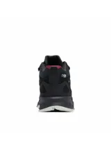 Bota de senderismo impermeable Columbia modelo Peakfreak Hera Mid Outdry, en color negro con detalles en bordó y suela blanca y negra. Confeccionada con empeine transpirable, tecnología de amortiguación Techlite+ y suela de gran tracción Adapt Trax.