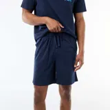 Conjunto de pijama compuesto por una remera de manga corta y un short, ambos en color azul marino. La remera presenta un estampado pequeño en el pecho con el logo de One Piece en color celeste.