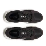 Championes Under Armour modelo Versurge, color gris con detalles en amarillo neón. Presentan una parte superior que combina malla textil con revestimientos de gamuza sintética, entresuela con tecnología Charged Cushioning para mayor amortiguación y suela de goma flexible.