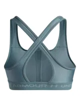 Top deportivo Under Armour color azul con espalda cruzada y logo en el frente.