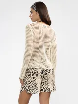 Shorts de lino con estampado animal print combinado de cebra y leopardo, de talle medio y corte relajado con bolsillos laterales.