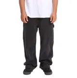 Pantalón de jean Billabong modelo Bad Dog, color negro, de corte holgado y estilo carpintero.