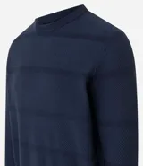 Buzo azul marino de algodón texturizado, con cuello redondo y mangas largas con puños ajustados.