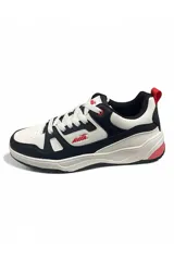 Championes deportivos Avia, color blanco con detalles en negro, rojo y rosado, con cordones y suela gruesa.