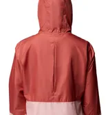 Campera cortavientos Columbia de mujer, bicolor en tonos rojo y rosado, con capucha ajustable, cierre frontal y bolsillos con cremallera.