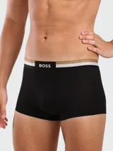 Bóxer de algodón elástico color negro con cintura elástica personalizada con el logo de la marca en contraste y detalles en blanco y dorado.