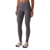 Calza deportiva de tiro alto con bolsillos laterales, confeccionada en tejido elástico de alta compresión, ideal para entrenamiento.