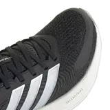 Championes de running adidas Supernova Ease 2, color negro con las clásicas tres tiras plateadas en los laterales y entresuela blanca con amortiguación.