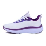 Championes deportivos Diadora modelo Moon para mujer, color blanco con detalles en morado. Presentan una capellada de malla transpirable, cordones blancos y una suela gruesa con capas en tonos de morado.
