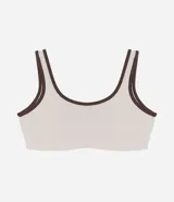 Top deportivo de microfibra color beige con detalles en contraste color marrón. Presenta escote redondo delantero, espalda con escote en V y copas desmontables.
