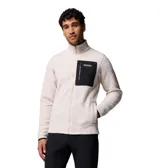 Campera polar de corderito en color beige, con cuello alto, cierre frontal completo y un bolsillo en el pecho de color negro con cierre y etiqueta de la marca. Cuenta con bolsillos laterales y puños con ribete elástico.