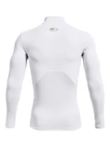 Remera térmica de compresión Under Armour con cuello alto, manga larga y diseño ergonómico. Confeccionada en tejido de doble capa con interior cepillado y paneles de malla elástica para ventilación estratégica.