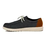 Zapato casual de hombre color caramelo con detalles en marrón y suela blanca.
